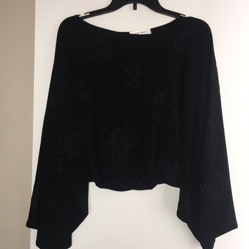 Black, long sleeve, subtle floral print top